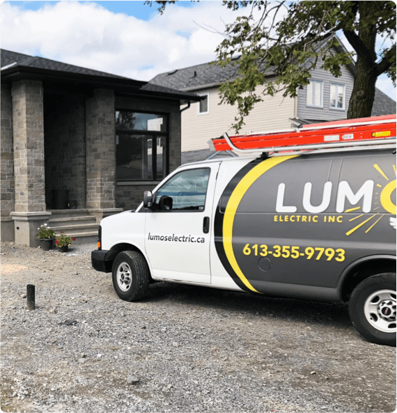 Lumos electric Van Lumos Electric Van in service outside a residential property